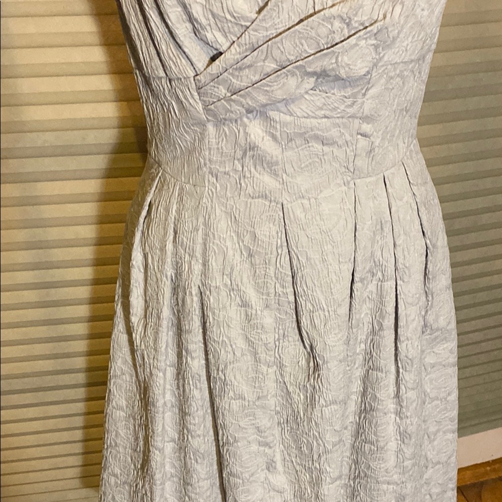 Elegant Creamy White Sleeveless Dress with beading. - Picture 3 of 6
